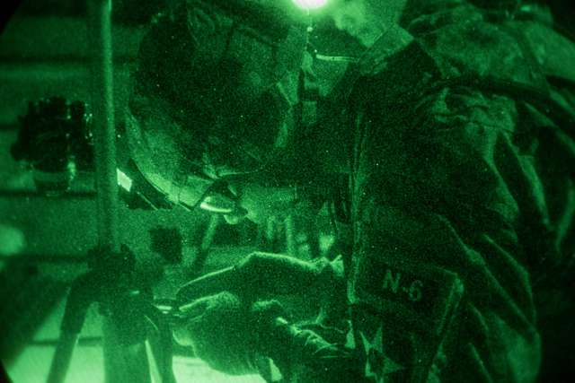 U.S. Army Sgt. Jeremy Kimbrough, plots a grid coordinate - PICRYL ...