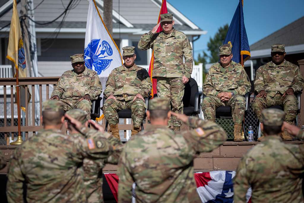New Jersey National Guard soldiers render a salute during the Task