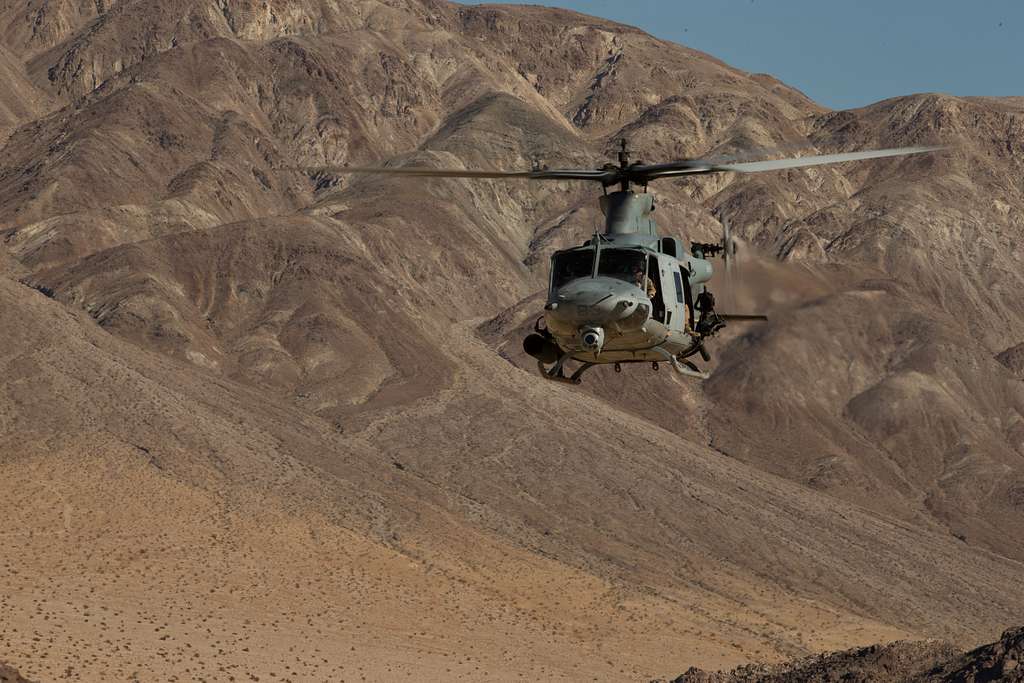 A U.S. Marine Corps UH-1Y Venom helicopter with Marine - NARA & DVIDS ...