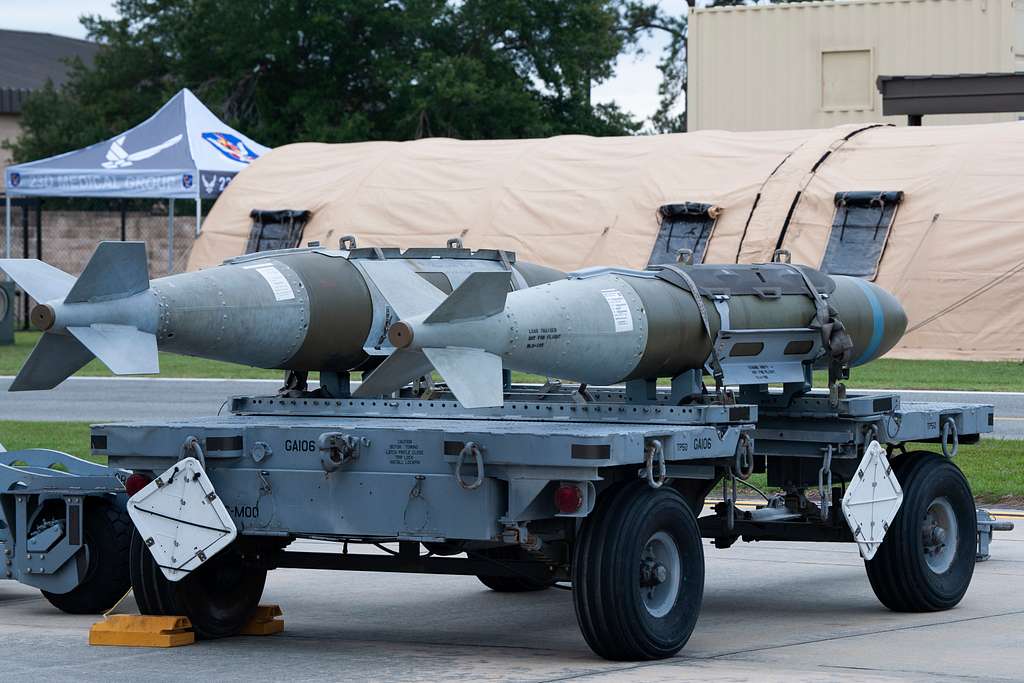 Munitions rest on a platform prior to a weapons - NARA & DVIDS Public ...