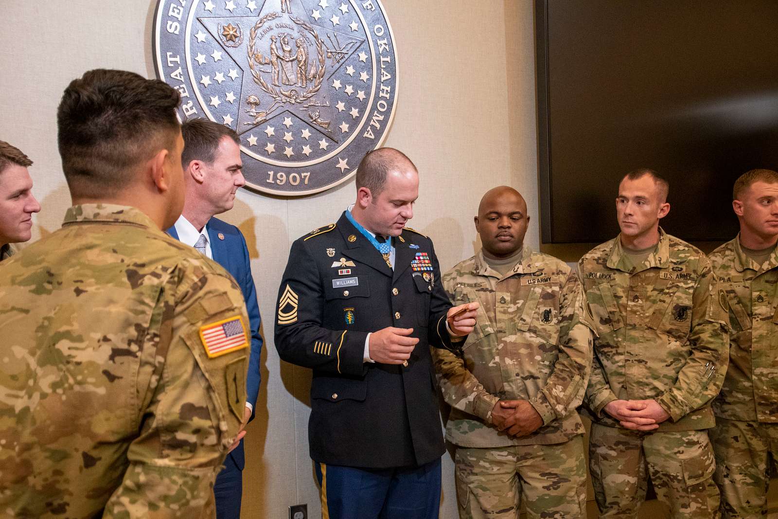 Sgt. Maj. Carlos A. Ruiz, Force Sergeant Major, Marine Forces Reserve  (MARFORRES), receives the first shot of the Moderna COVID-19 vaccination at  Marine Corps Support Facility New Orleans, Mar. 2, 2021. MARFORRES