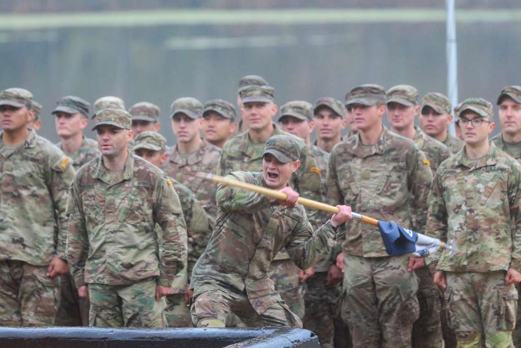 A U.S. Army Ranger thrusts his company's guidon into - NARA & DVIDS ...