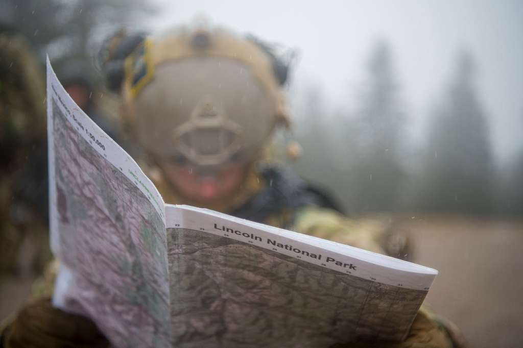 A Tactical Air Control Party Airman plans a land navigation - PICRYL ...