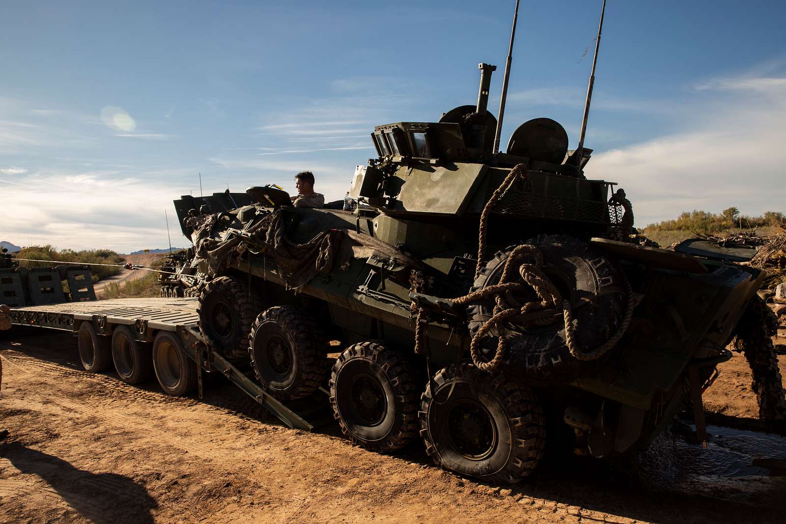 A Light Armored Vehicle 25 is loaded onto a Logistics - NARA & DVIDS ...