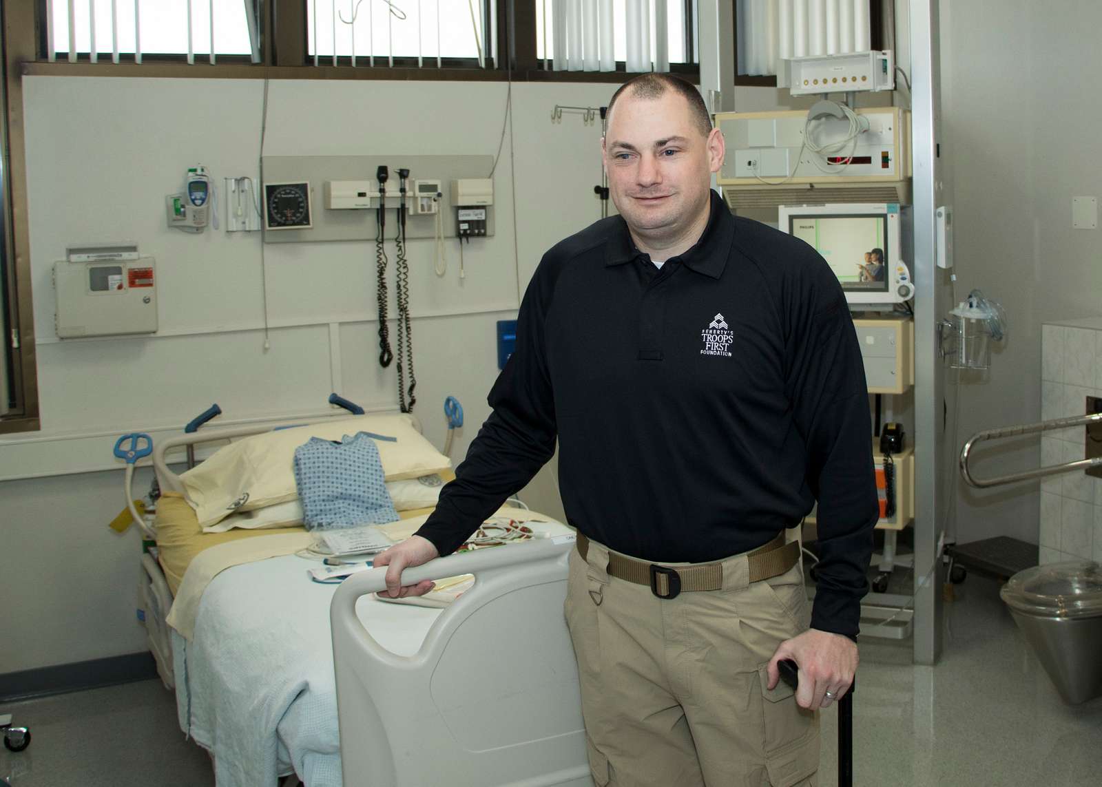 Matthew Bradford poses for a photo in a room at the - NARA & DVIDS ...