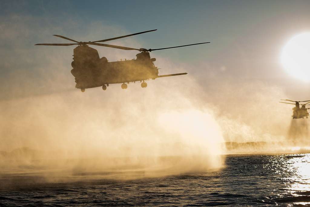 Premium stock video - Chinook military helicopter flying in uk evening light