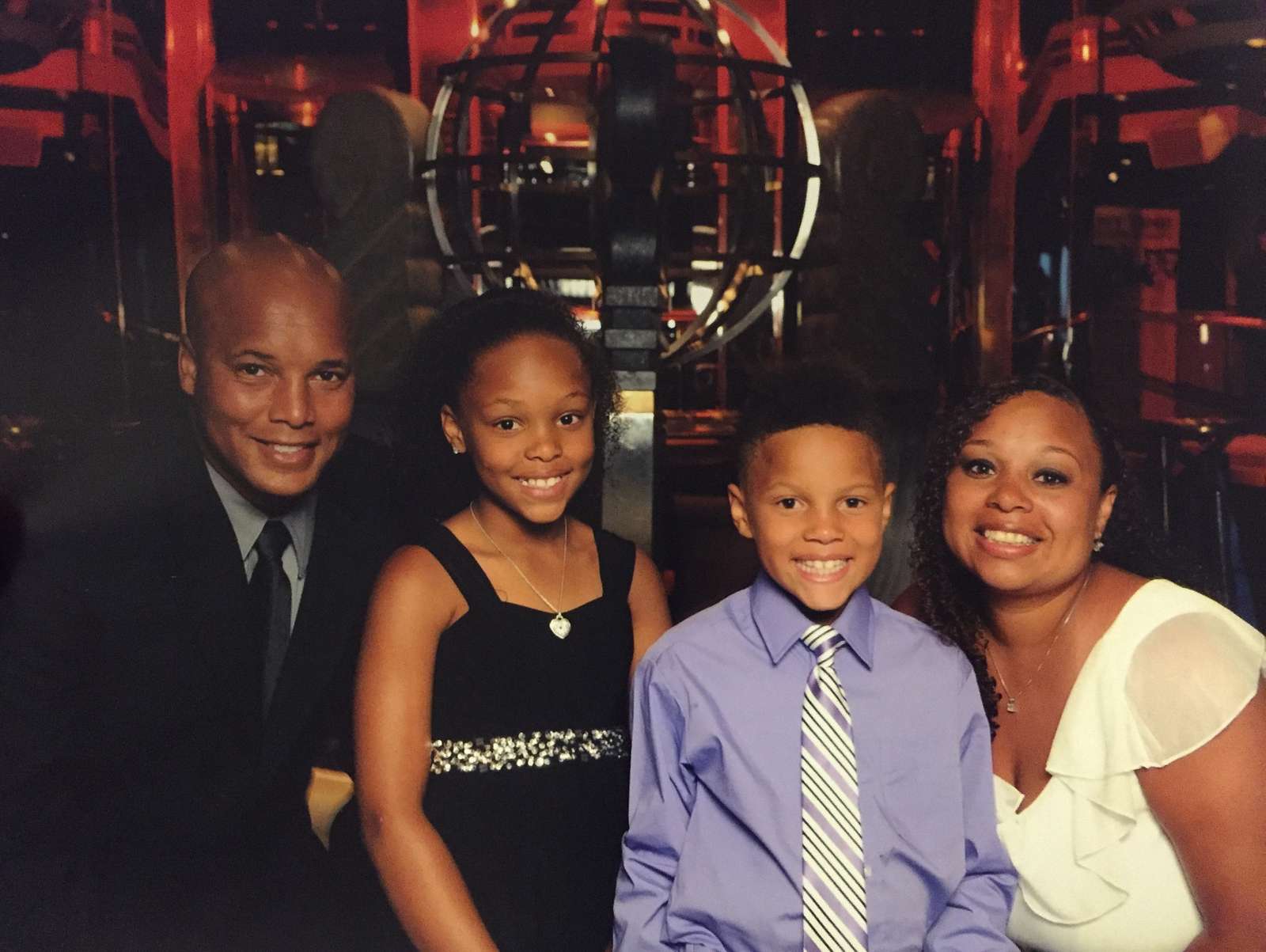 Gina and Byron Ball pose for a photo with their children. - NARA ...