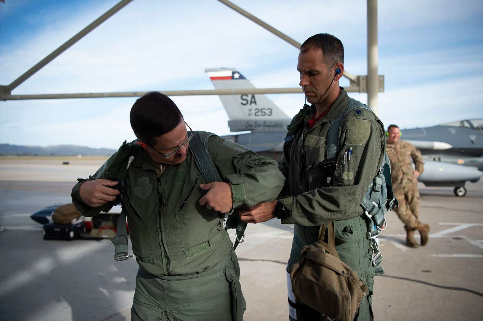 A U.S. Air Force Academy football team helmet and jersey are displayed on  the flightline at Davis-Monthan Air Force Base, Ariz., Dec. 27, 2016. The  helmet's design replicates the one used for