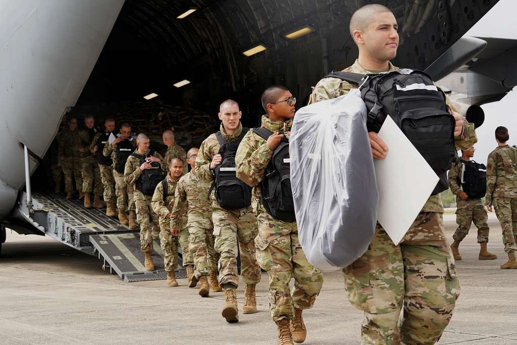 Airmen exit from the rear of a C-17 Globemaster III - NARA & DVIDS ...