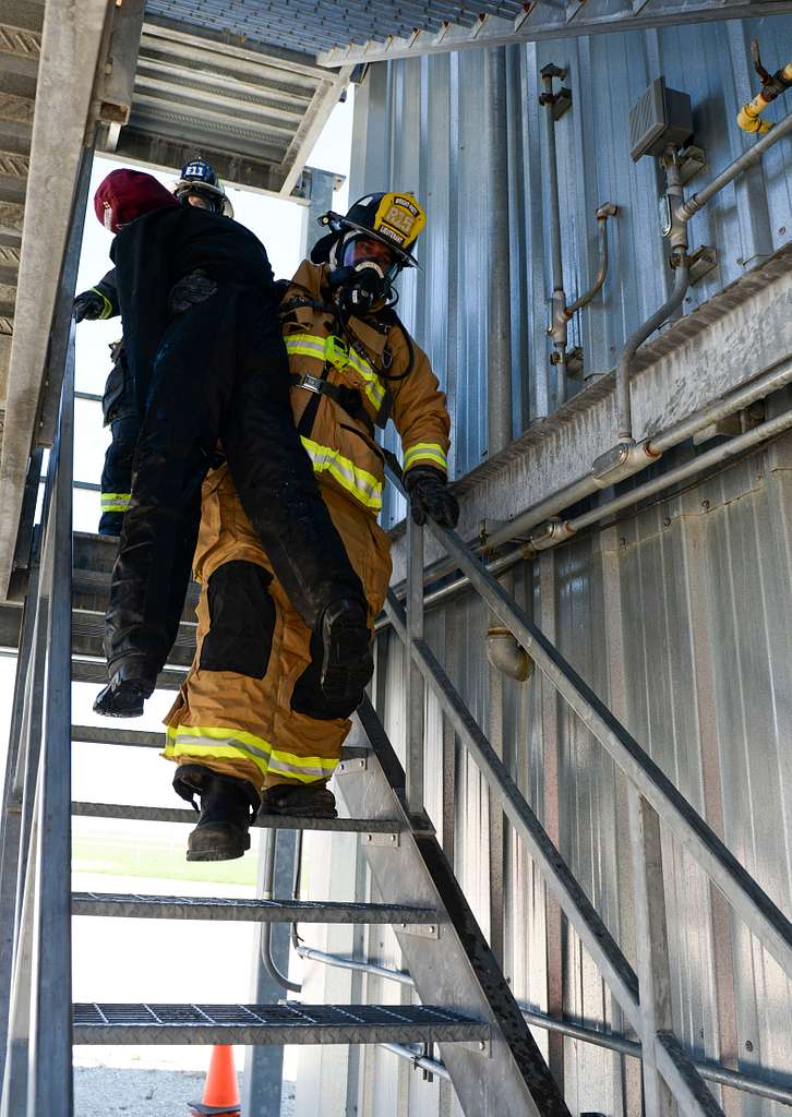 A firefighter with the 788th Civil Engineer Fire Department - NARA ...