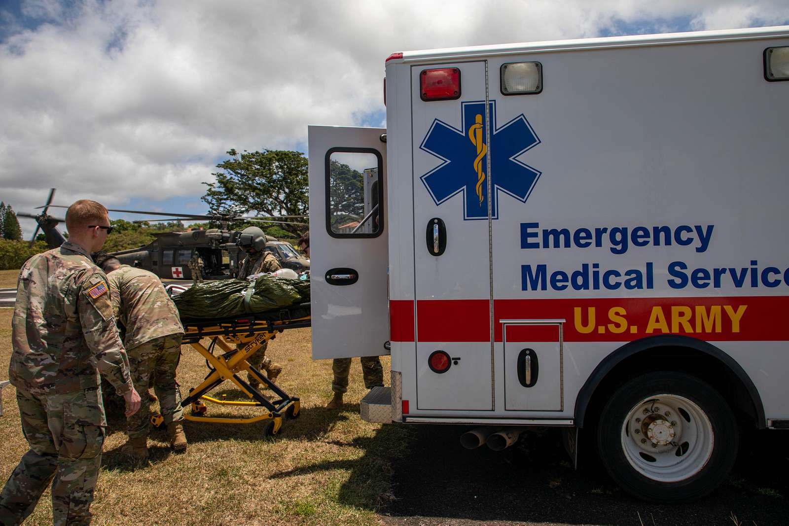 U.S. Army Staff Sgt. Anthony Marotta, right, and Sgt. Jeff Angle, UH-60L  Black Hawk helicopter crew chiefs with the New Jersey National Guard's  1-150th Assault Helicopter Battalion, conduct gear checks before hoist