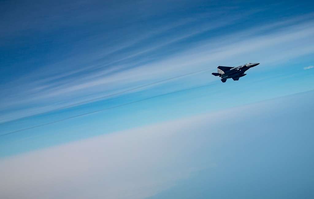 A U.S. Air Force F-15E Strike Eagle flies over the - NARA & DVIDS ...