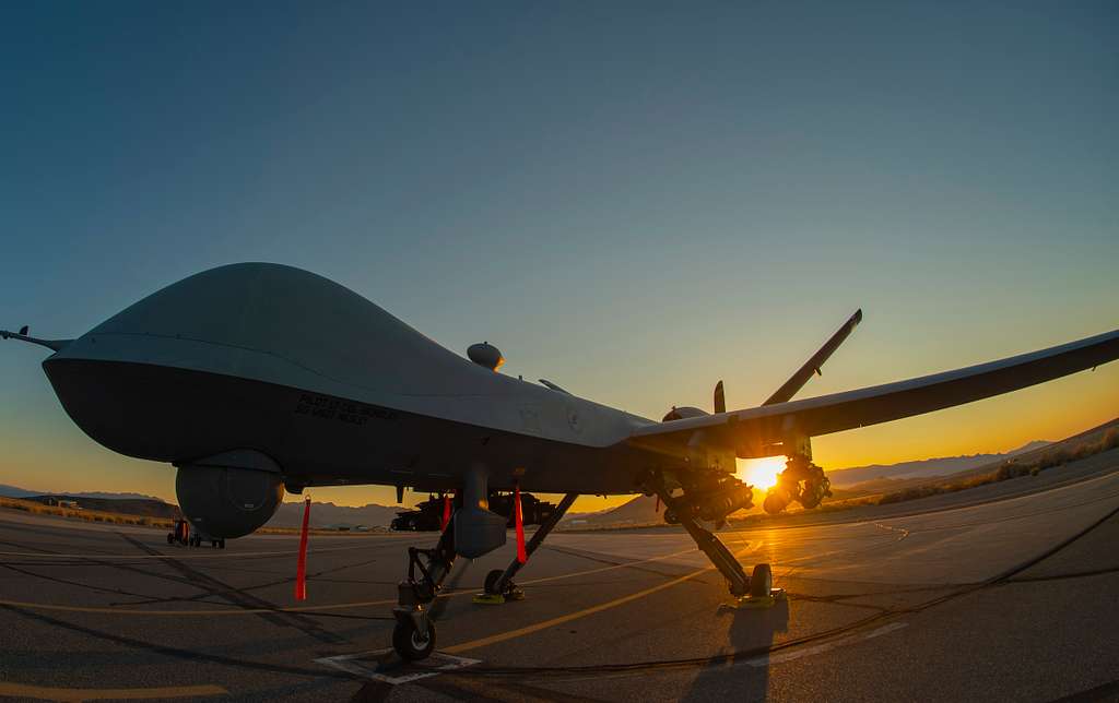 An MQ-9 Reaper armed with eight AGM-114 Hellfire missiles - PICRYL ...