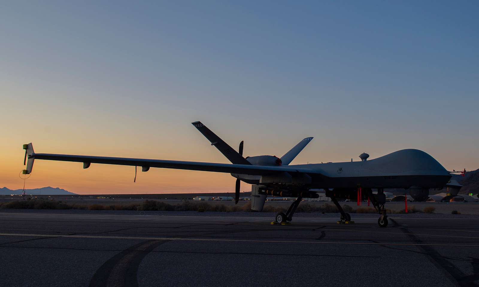 An MQ-9 Reaper armed with eight AGM-114 Hellfire missiles - NARA ...