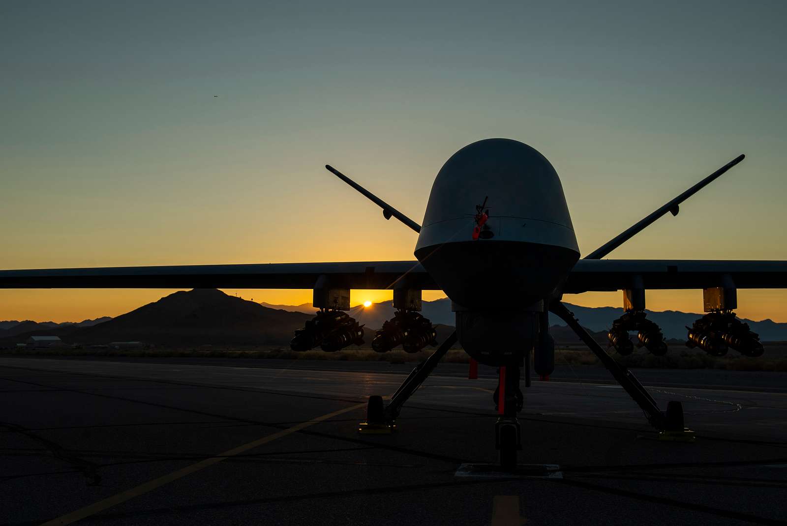 An MQ-9 Reaper armed with eight AGM-114 Hellfire missiles - NARA ...