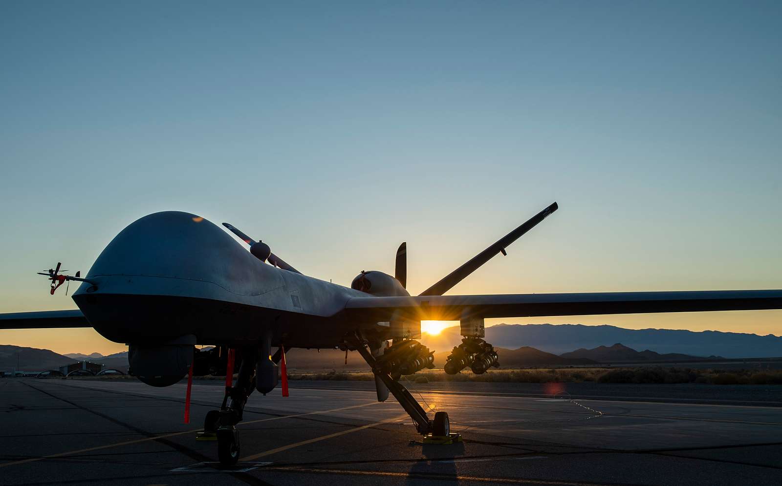 An MQ-9 Reaper armed with eight AGM-114 Hellfire missiles - NARA ...