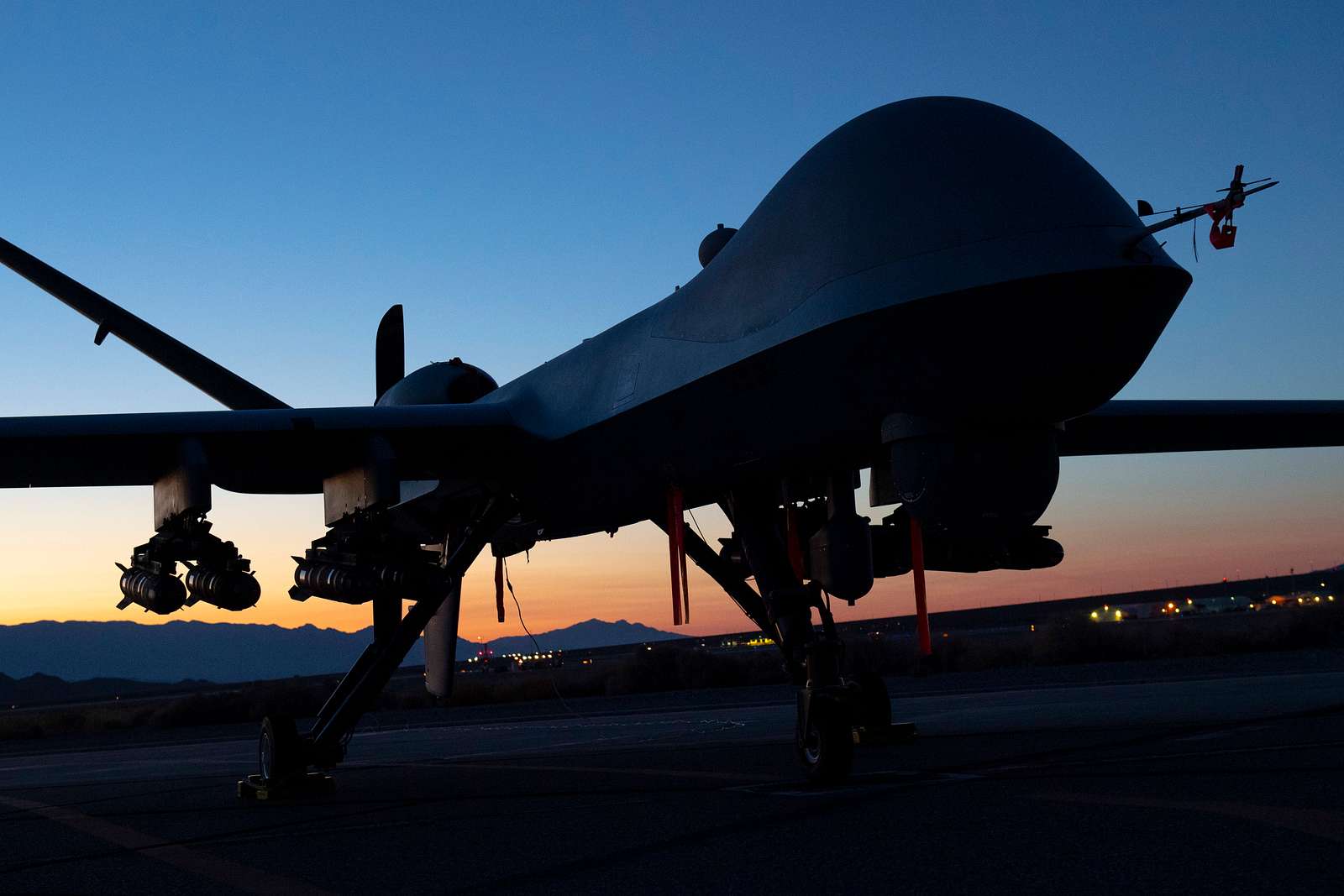 An MQ-9 Reaper armed with eight AGM-114 Hellfire missiles - NARA ...