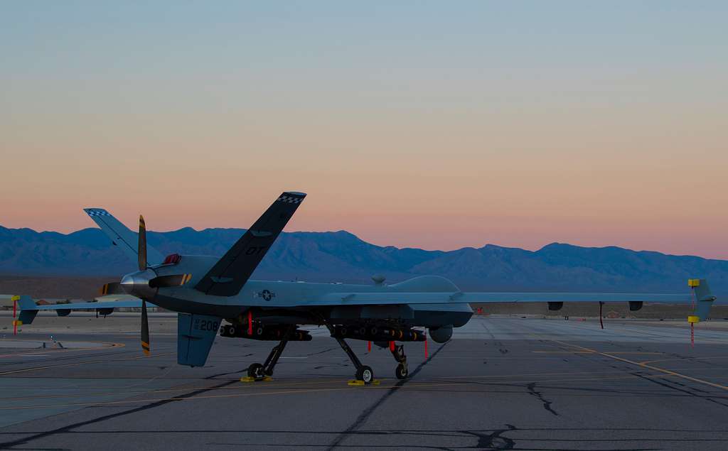 An MQ-9 Reaper armed with eight AGM-114 Hellfire missiles - NARA ...