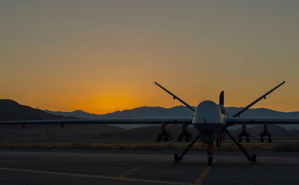 An MQ-9 Reaper armed with eight AGM-114 Hellfire missiles - PICRYL ...