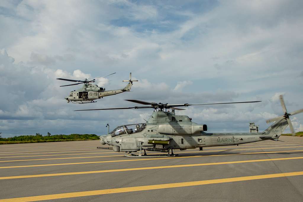 A U.S. Marine Corps UH-1Y Venom Helicopter (left) And - NARA & DVIDS ...