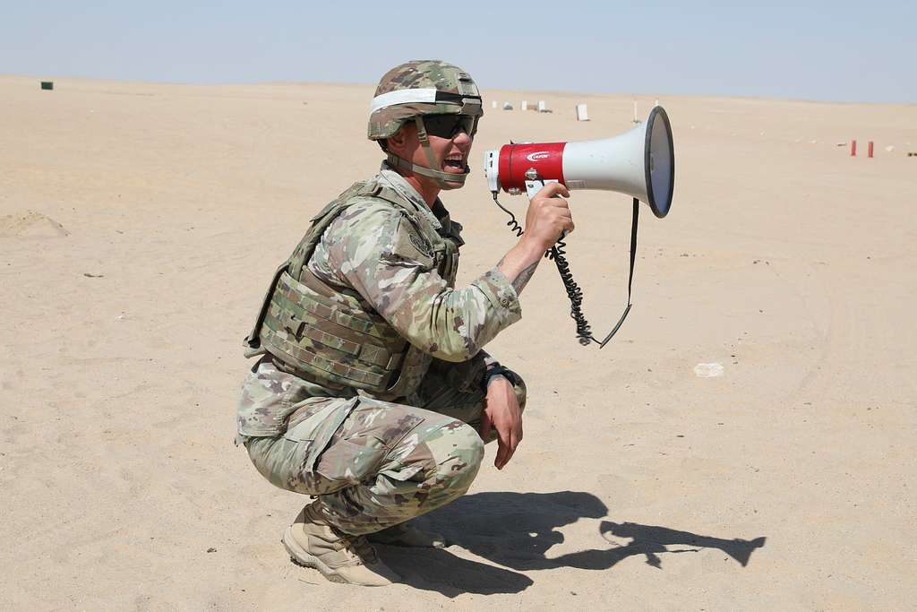 Sgt. 1st Class Michael Trask issues fire commands during PICRYL