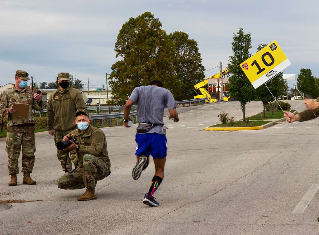 A runner crosses the finish line Oct. 18, 2020, during - PICRYL