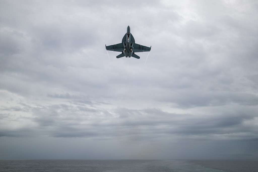 An F/A-18F Super Hornet attached to the 