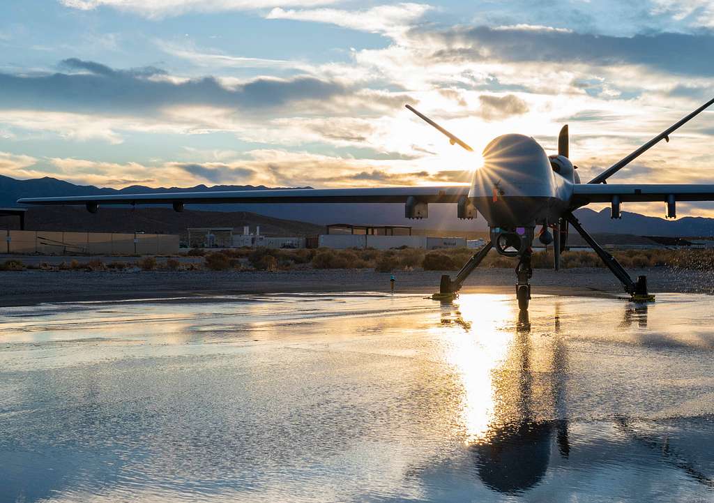 An MQ-9 Reaper is parked on a taxiway during sunset - PICRYL Public ...