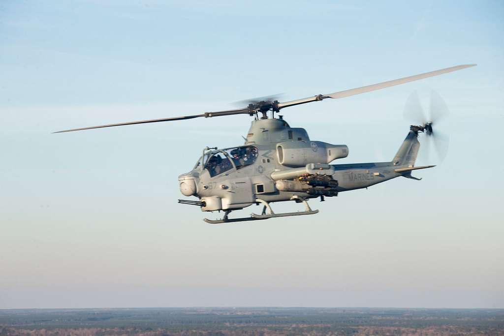 A U.S. Marine Corps AH-1Z Viper helicopter with Marine - NARA & DVIDS ...