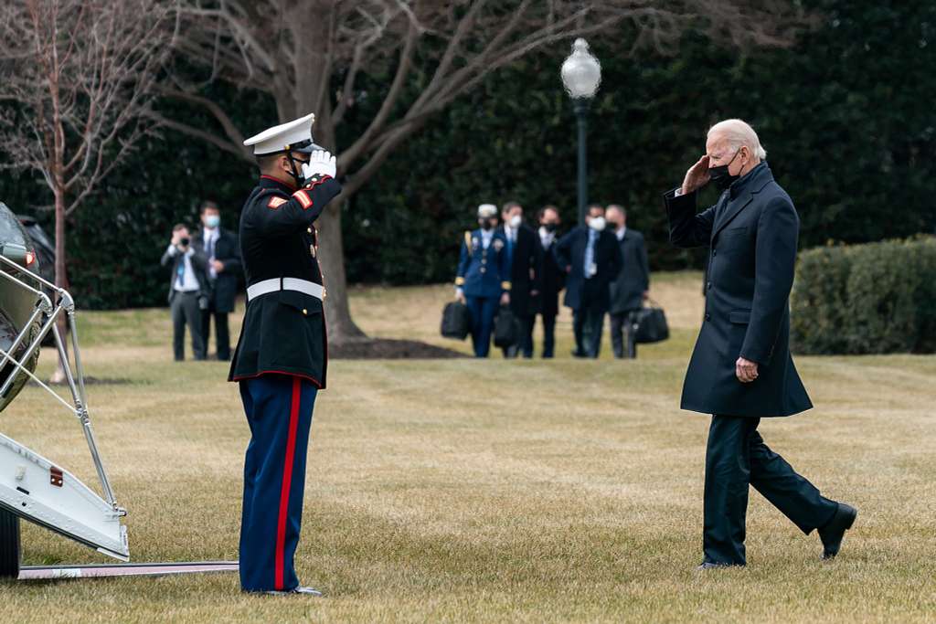 President Joe Biden greets Ret. U.S. Army Sgt. Peter Francis, his