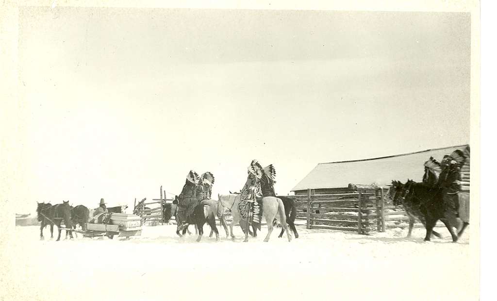 Funeral Procession For Chief Plentycoops; Mounted Men In Traditional 