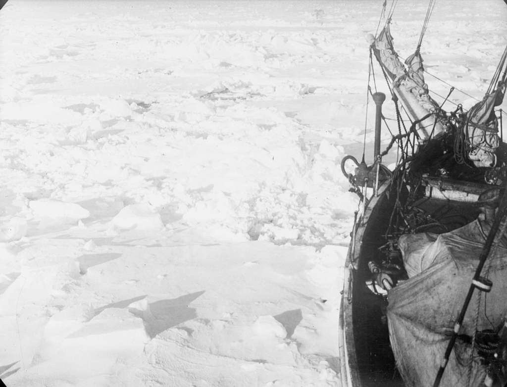 A distant bow view of 'Endurance' (1912) frozen into the ice floe