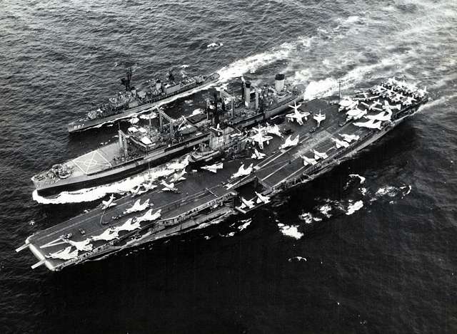 USS Passumpsic (AO-107) refueling USS Ticonderoga (CVA-14) and USS ...