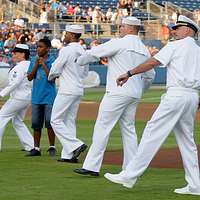 The color guard parades the colors before a Miami Marlins game at