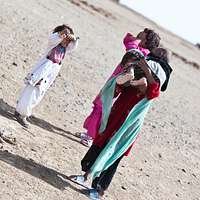 Iraqi children talk with U.S. Army Spc. Heath Mashtare - NARA