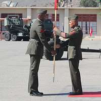 Sgt. Maj. Carlos Ruiz (center), outgoing sergeant major - NARA