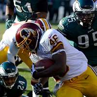 Washington Redskins running back Alfred Morris (R) picks up yardage in the  fourth quarter of the NFL Pro Bowl at University of Phoenix Stadium in  Glendale, Arizona January 25, 2015. UPI/Art Foxall