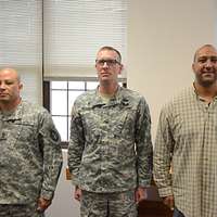 Sgt. Maj. Carlos Ruiz (center), outgoing sergeant major - NARA