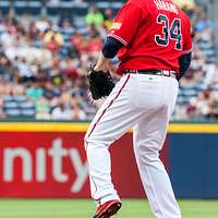 Atlanta Braves catcher Evan Gattis warms up during - NARA & DVIDS Public  Domain Archive Public Domain Search