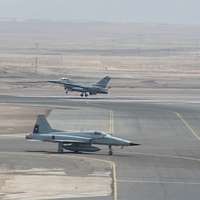 F-4G Phantom fighter aircraft from the 35th Tactical Fighter Wing, Tactical  Air Command, fly over the coastline of Bahrain during Operation Desert  Shield. The aircraft are armed with AGM-88 high-speed, anti-radiation,  air-to-surface