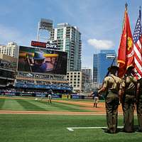 180411-N-SM577-0304 BIRMINGHAM, Ala. (April 11, 2018) Sailors assigned to  USS Constitution post the colors during the national anthem at the opening  day game of the Birmingham Barons baseball team during Navy Week