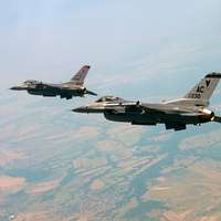 F-4G Phantom fighter aircraft from the 35th Tactical Fighter Wing, Tactical  Air Command, fly over the coastline of Bahrain during Operation Desert  Shield. The aircraft are armed with AGM-88 high-speed, anti-radiation,  air-to-surface