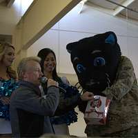 Screech, the Washington Nationals' mascot, offers Chief Navy Career  Counselor Michael Robinson his cover. - PICRYL - Public Domain Media Search  Engine Public Domain Search