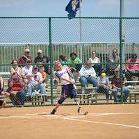 CAMP FOSTER, Okinawa, Japan – A child practices batting at a youth baseball  clinic July 29 aboard Camp Foster, Okinawa, Japan. The baseball clinic  hosted four different stations: hitting, running, catching and