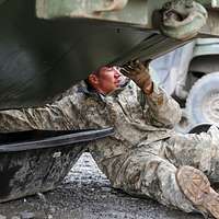 Alaska Guardsman Spc. Brodie Smith a wheeled vehicle PICRYL