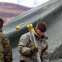 Alaska Guardsman Spc. Brodie Smith a wheeled vehicle NARA