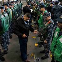 DVIDS - Images - Nimitz Sailors Pose For Photo With Team Mascot