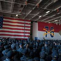 180411-N-SM577-0304 BIRMINGHAM, Ala. (April 11, 2018) Sailors assigned to  USS Constitution post the colors during the national anthem at the opening  day game of the Birmingham Barons baseball team during Navy Week