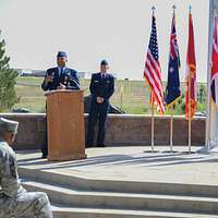 Col. Lorenzo Bradley, 460th Operations Group commander, along with