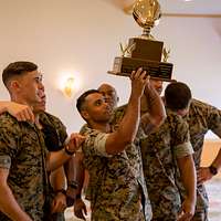 CAMP HANSEN, OKINAWA, Japan- Members from the Hansen Outlaws enjoy a  complimentary buffet lunch August 3 during a trophy presentation aboard  Camp Hansen, Okinawa, Japan. The Outlaws presented the U.S. Forces Japan- American